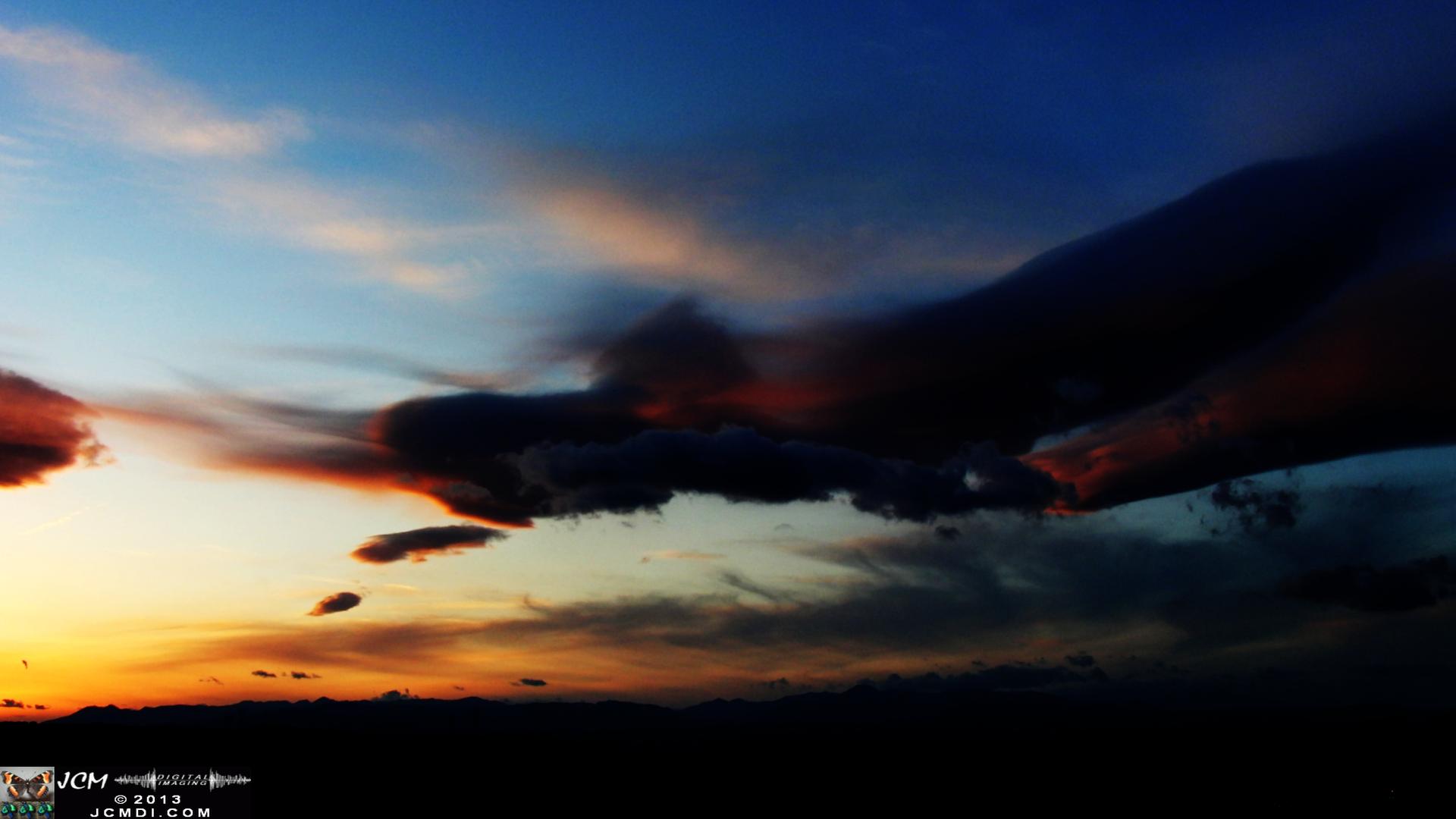 3-9-2010 Spectacular UFO lenticular Cloud and sunset stills with rainbow ice crystals